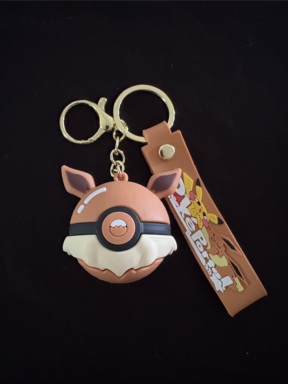 Pokรฉmon Eevee Ball Keychain Bag Charm - Tan and Cream